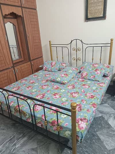 good condition solid iron bed