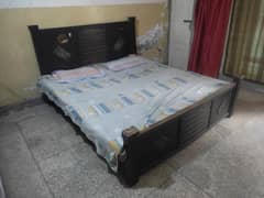 King size bed in use normal condition