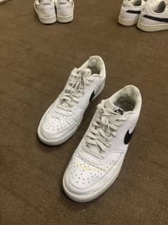 Nike low court vision
