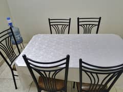 Six seater dining table along with chairs