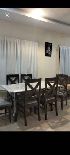 6 seater wooden dinning table with white marble  top
