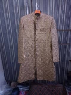 Golden color sherwani