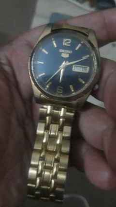 classic vintage golden black dial Seiko 5 automatic watch