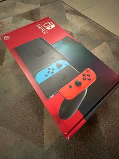 Nintendo Switch V2 with 2 games