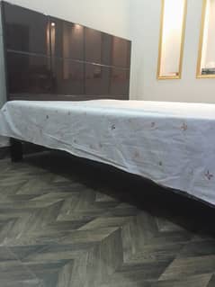 Almost new ,wooden bed