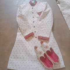sherwani and khussa