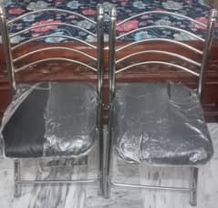 Steel folding chair.