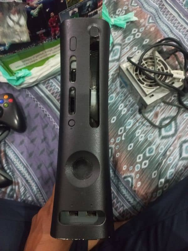 Xbox 360 with two wireless controllers 4
