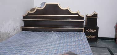 single bed with 2 site tables