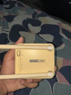 totolink router along with adapter for sale