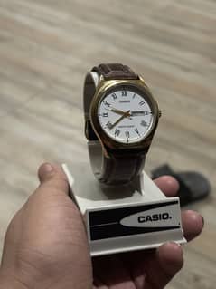 casio watch gold and brown