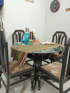 four chair wooden dinning table
