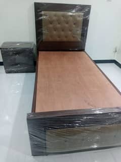 Bed with side table