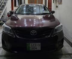 Toyota Corolla GLI 2012. Red wine color