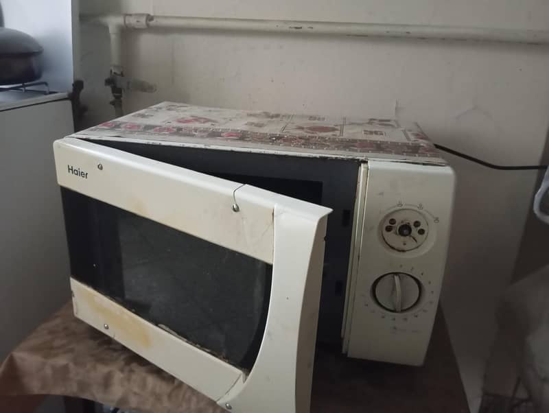 microwave with good condition only in 10,000 2