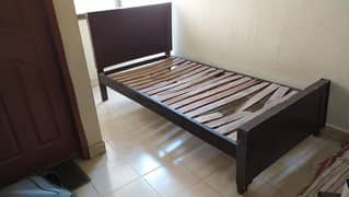 Single bed with side table