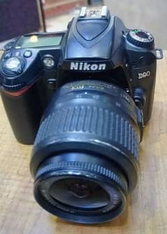 My Nikon DSLR camera Good Condition Model D90 with Charger Beg