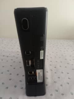 Xbox 360slim. model 1439. for sale with 2 controllers. wire less and wire