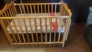 wooden baby cot with mattress