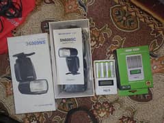 SHANNY flash gun SN600SC with ICON battery charger and 4 camelion cell