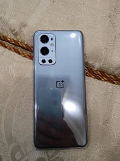 Oneplus 9 pro (with original charger and box)