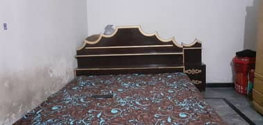 single bed with 2 site tables