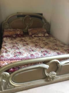 king size bed with two side tables