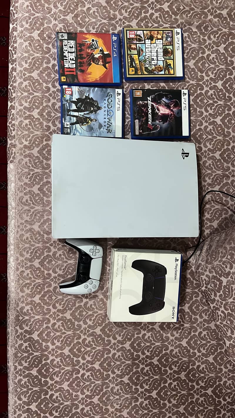 PS5 FAT WITH EXTRA CONTROLLER AND GAMES 0
