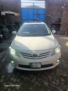 Toyota Corolla Altis 1.6 SR 2011 | Manual | Sunroof | White | Tracker