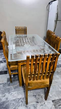 Dining table 6 seater glass top, slightly used