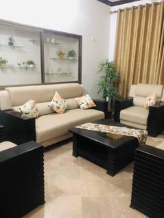 7 seater off white sofa with tabels