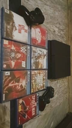 Playstation 4 with controller and games