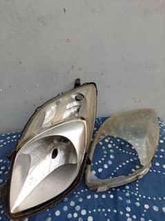 Vitz (2007) broken headlight right side*