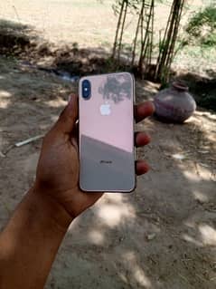 I phone xs bettery 75 golden color 64 gb