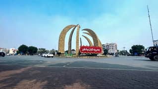 10 marla plot for sale on ground possession LDA aproved sector E in TAUHEED block bahria town lahore