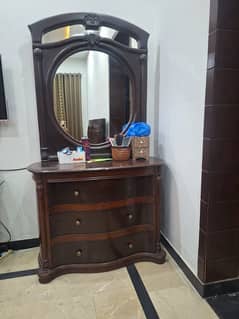 bed with side table and dressing