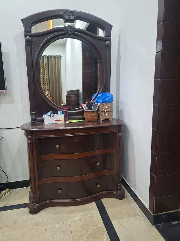bed with side table and dressing 0