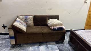 Brown L shaped sofa