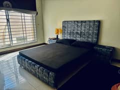 Queen bed with side table and new matress