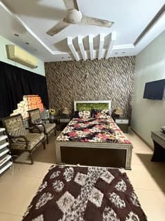 King size bed along with two chinioti chairs and wardrobe