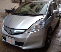 Honda fit hibrid 2011 model reg 2014 urgent sall 2290000