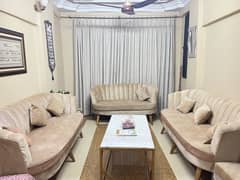 3 sofas and Curtains