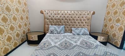 Bed with side tables
