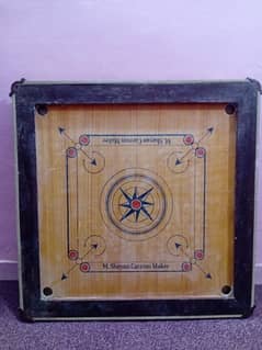 4. "Classic Carrom Board - Perfect for Family Game Nights"