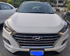 TUCSON AWD TOTAL GENUINE