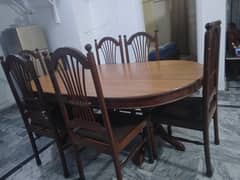 reseanable oval wooden dining table with 6 chairs