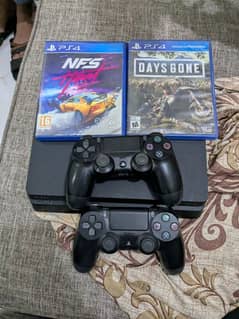 playstation 4 slim with two controller