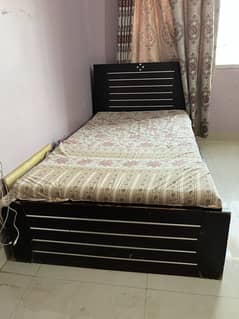 Wooden single bed