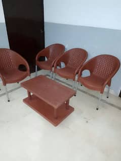 Plastic chairs 4 and 1 Table set
