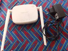 Tenda Router with adopter